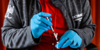 The lead nurse prepares a syringe with a Covid-19 vaccine at the Peoples Congregational United Church of Christ, the site of the Ward 4 DC Covid Center, in Washington, D.C. on March 31, 2023.