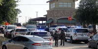 Emergency personnel work the scene of a shooting at Allen Premium Outlets on May 6, 2023 in Allen, Texas.