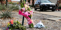 A makeshift memorial at Allen Premium Outlets on May 7, 2023, in Allen, Texas.