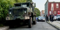 Police respond to the theft of a military vehicle in Baltimore on May 12, 2023.