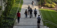 Students Walk on a university campus.