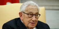Former Secretary of State Henry Kissinger speaks during a meeting with President Donald Trump at the White House, on Oct. 10, 2017.
