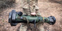 Life in trenches in Kyiv Oblast, Ukraine - 12 Apr 2022

A Ukrainian soldier holds the MBT-NLAW (Next generation Light Anti-tank Weapon) provided by the United Kingdom to the Ukrainian army. As Russia retreated from Kyiv Oblast, and now concentrates the offensive in the eastern part of Ukraine, Alexander (48), Sergey (42), Andrew (41), Oleg (31) and their battalion might send to the Eastern part of Ukraine in a few days to join the battle operation.