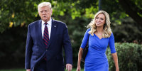 Then-President Donald Trump and White House Press Secretary Kayleigh McEnany walk toward members of the press prior to Trump’s departure from the White House on Sept. 15, 2020.