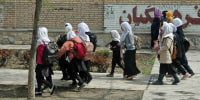 Girls leave their school for the day in Kabul, Afghanistan, on June 5, 2023.