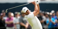Brooks Koepka hits from the fairway during the the PGA Championship golf tournament