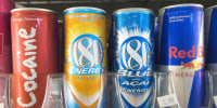 Cans of energy drinks are displayed in a store in San Diego, California 10 November 2006. The kick from caffeine has a growing number of consumers jumping into energy drinks-soft drinks spiked with nutritional aids and stimulants despite warnings from health professionals. The drinks are often aimed at the youth market with edgy names like Rockstar and Full Throttle, and the provocatively named Cocaine Energy Drink, which despite its name contains no illegal ingredients. The typical energy drink sells for two dollars or more per can or bottle, well above the average price of traditional soft drinks.