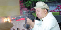 North Korean leader Kim tours weapons factories and vows to advance his arms and his war readiness
