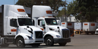 Yellow Corp. trucks sit at a company facility in Hayward, Calif.