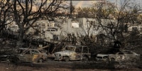 Burnt cars and buildings in Lahaina town Maui, Hawaii on Aug. 16, 2023.