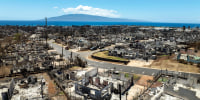 The aftermath of a devastating wildfire in Lahaina, Hawaii, Tuesday, Aug. 22, 2023. Shares of Hawaiian Electric Company's parent fell more than 16% on Friday, Aug. 25, one day after the utility was sued by Maui County over the fires that devastated Lahaina earlier this month.