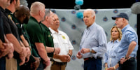 President Joe Biden greets first responders with Jill Biden and Republican Sen. Rick Scott in Live Oak, Fla., on Sept. 2, 2023.