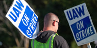 Workers with the UAW Local 2250 Union strike outside the General Motors Wentzville Assembly Plant on Sept. 15, 2023 in Missouri. 