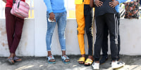 Some of the men charged with public displays of affection with members of the same sex outside a court in Lagos, Nigeria on Oct. 27, 2020. 