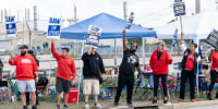 United Auto Workers members picket outside the Jeep Plant in Toledo, Ohio