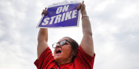 United Auto Workers (UAW) picket outside of the Stellantis Mopar parts facility on September 22, 2023 in Naperville, Illinois. The United Auto Workers today expanded their strike against the big three U.S. automakers to include 38 GM and Stellantis parts facilities.