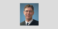 Judge Brian N. Lovell.