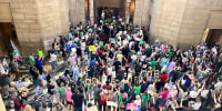 FILE - Hundreds of people descend on the Nebraska Capitol, in Lincoln, on May 16, 2023, to protest plans by conservative lawmakers in the Nebraska Legislature to revive an abortion ban. An 18-year-old Nebraska woman was sentenced Thursday, July 20 to 90 days in jail followed by two years of probation for burning and burying a fetus last year after she took medication given to her by her mother to end her pregnancy, Celeste Burgess was sentenced after pleading guilty earlier this year to a count of concealing or abandoning a dead body. (AP Photo/Margery Beck, file)