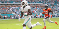 De'Von Achane of the Miami Dolphins during a game against the Denver Broncos in Miami Gardens, Fla.