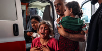 Injured children arrive at Nasser Medical Hospital in Khan Younis, Gaza.