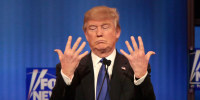 Then-Republican presidential candidate Donald Trump shows off the size of his hands at a debate in Detroit in 2016.