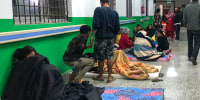 People gather in the corridor of the Jajarkot district hospital in the aftermath of an earthquake in Nepal on Nov. 4, 2023.