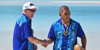  Australia on Friday offered the island nation of Tuvalu a lifeline to help residents escape the rising seas and increased storms that climate change is bringing. (Mick Tsikas/AAP Image via AP)
