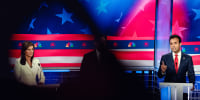 Republican presidential candidate and former U.N. Ambassador Nikki Haley, left, debates with presidential candidate and businessman Vivek Ramaswamy
