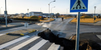 A large crack opens up across the main road in Grindavik, southwestern Iceland on Nov. 13, 2023.