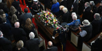 Former First Lady Rosalynn Carter's casket is carried out following a tribute service at Glenn Memorial Church in Atlanta,  