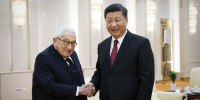 Former U.S. Secretary of State Henry Kissinger arrives for a meeting with Chinese President Xi Jinping at the Great Hall of the People in Beijing