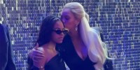 Beyoncé kisses Blue Ivy on the cheek on the red carpet of the "Renaissance" film premiere in London.