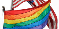 Image: The Rainbow Flag flies beneath the American flag at the Stonewall National Monument in New York.