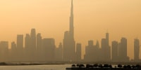 Haze obscures the Dubai skyline including Burj Khalifa, the world's tallest building on Dec. 4, 2023. The United Arab Emirates is choking under "alarmingly high" air pollution levels fed by its fossil fuel industry, Human Rights Watch warned on December 4, as the oil-rich country hosts the UN's COP28 climate talks in Dubai. 