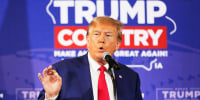 Donald Trump speaks during a Commit to Caucus rally