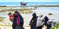 More than 100 Rohingya refugees, including women and children, landed in Indonesia's westernmost province on December 2, officials said, but locals threatened to push them back to sea. 