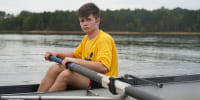Callum Bradford rows during a club team practice at Jordan Lake in Apex, N.C.,