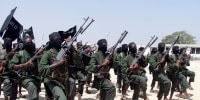 Al-Shabaab fighters perform military exercises.