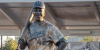 The statue of Jackie Robinson before if was cut down in Wichita, Kan.