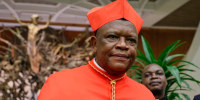 Cardinal Fridolin Among Besungu leaves after receiving the red three-cornered biretta hat from Pope Francis at St. Peter's Basilicaon Oct. 5, 2019.