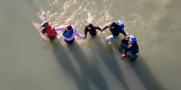 An aerial view migrants crossing the Rio Grande.