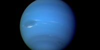 An August 1989 image of Neptune photographed by the Voyager 2 spacecraft, processed to enhance the visibility of small features.