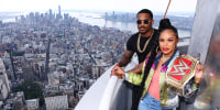 Montez Ford and Bianca Belair visit the Empire State Building in New York City in 2022.