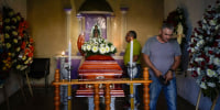 Mourners attended the wake of mayoral candidate Armando Perez in Maravatio, Michoacan state, Mexico, on Tuesday, Feb. 27, 2024. Perez, a member of the opposition National Action Party, and another mayoral hopeful for Maravito were both fatally shot the previous day within hours of each other.