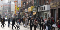 Pedestrians in the Chinatown neighborhood of New York