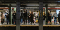 Commuters at the Times Square subway station in New York in January.
