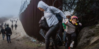 Migrants At The US-Mexico Border