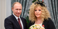 Russian President Vladimir Putin, left, and Russian pop singer Alla Pugacheva