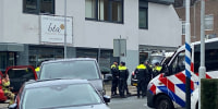 Heavily armed police have cordoned off part of a Dutch town and say that multiple people are being held hostage in a building there.