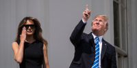 Then-President Donald Trump looks up toward the Solar Eclipse